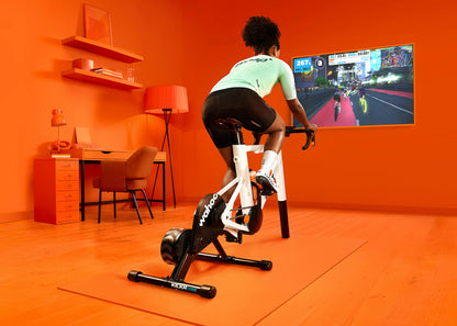 Cyclist training indoors on Zwift with the Wahoo KICKR CORE 2 smart trainer